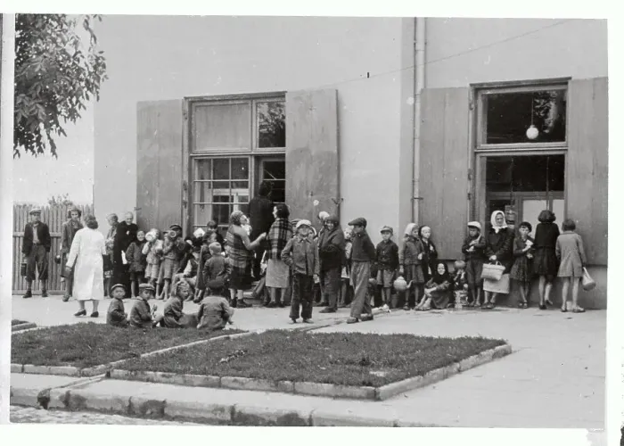 Framed Print : Women and Children Waiting Outside of an Emergency Office Framed Print : Women and Children Waiting Outside of an Emergency Office
