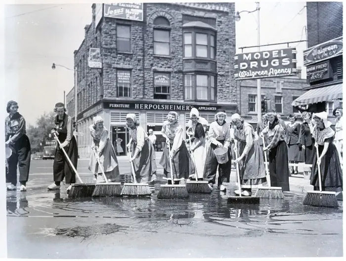 Framed Print : Women In Dutch Costume Washing Streets