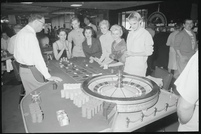 Framed Print : Women Gambling at Roulette Wheel Framed Print : Women Gambling at Roulette Wheel