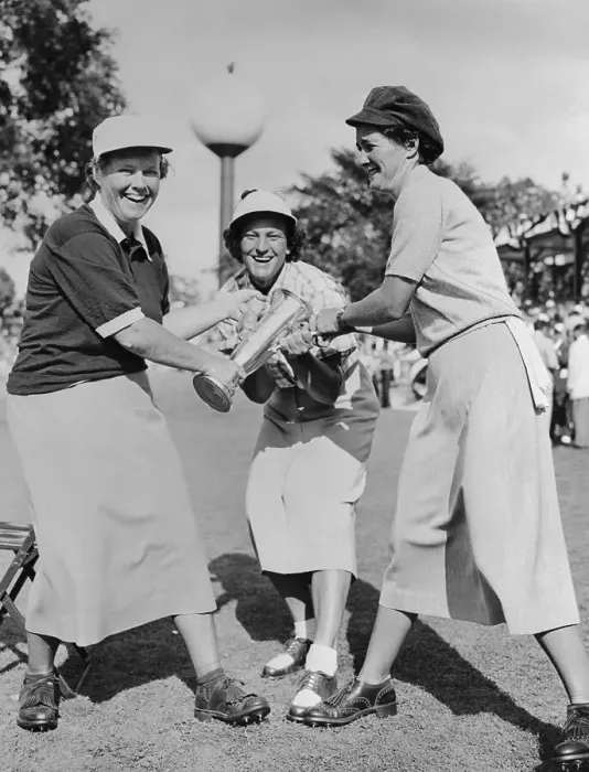 Framed Print : Women Golfers Pulling Golf Trophy Framed Print : Women Golfers Pulling Golf Trophy