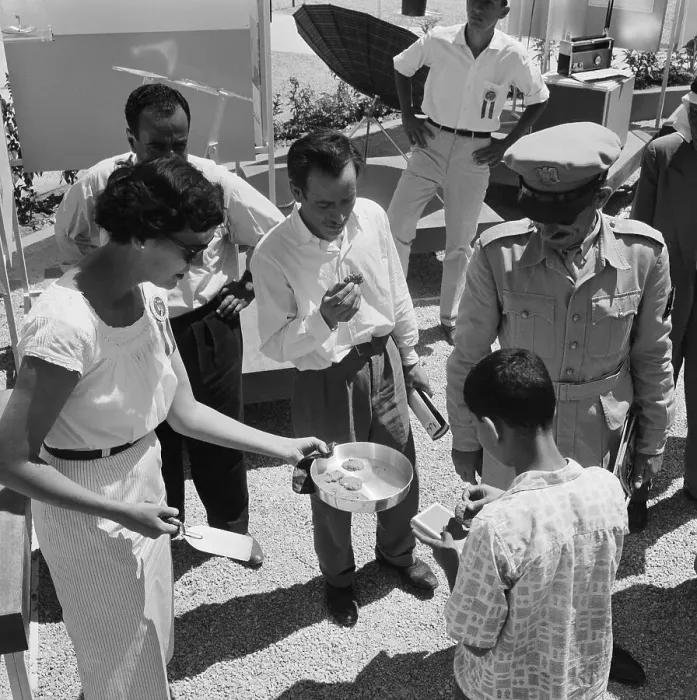 Framed Print : Women Handing out Cookies at Damascus Trade fair Framed Print : Women Handing out Cookies at Damascus Trade fair