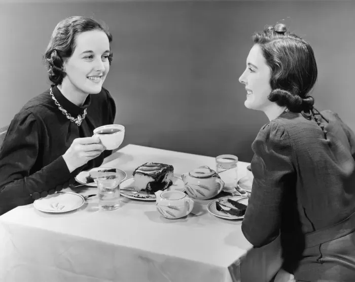 Framed Print : Two women having coffee and cake (B&W) Framed Print : Two women having coffee and cake (B&W)
