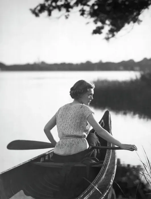 Framed Print : Women Holds Paddle While In Canoe Framed Print : Women Holds Paddle While In Canoe