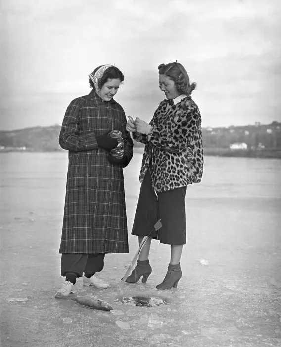 Framed Print : Women ice fishing Framed Print : Women ice fishing