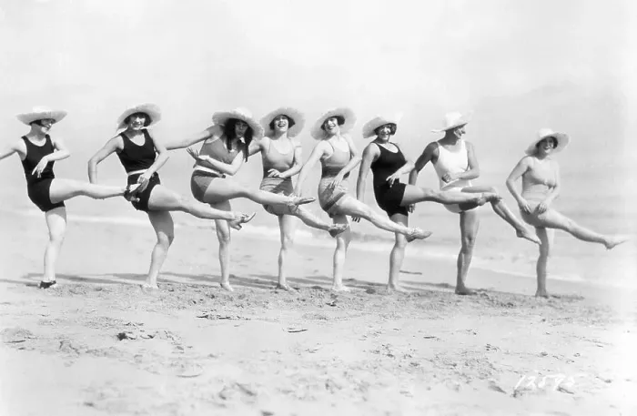 Framed Print : Women Kicking in Unison on the Beach Framed Print : Women Kicking in Unison on the Beach