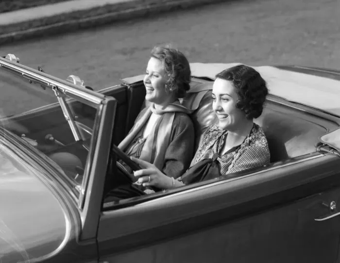 Framed Print : Women Both Are Laughing While The Drivers Wearing A Wedding Band & Lace Shawl Driving A Framed Print : Women Both Are Laughing While The Drivers Wearing A Wedding Band & Lace Shawl Driving A