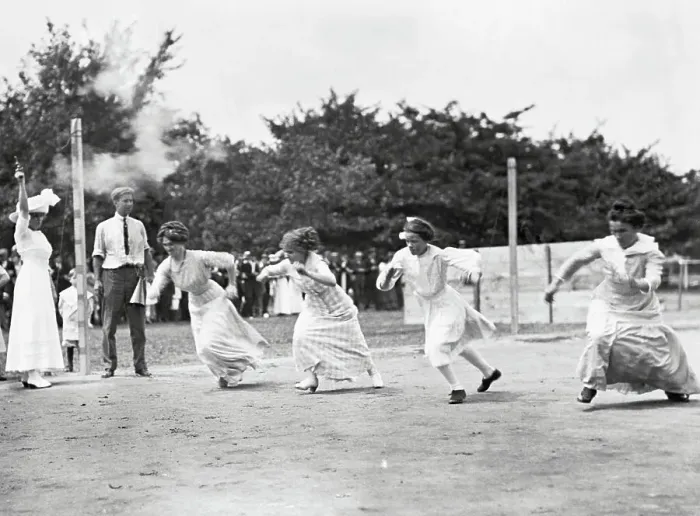 Framed Print : Women in Long Dresses Sprint in Race Framed Print : Women in Long Dresses Sprint in Race