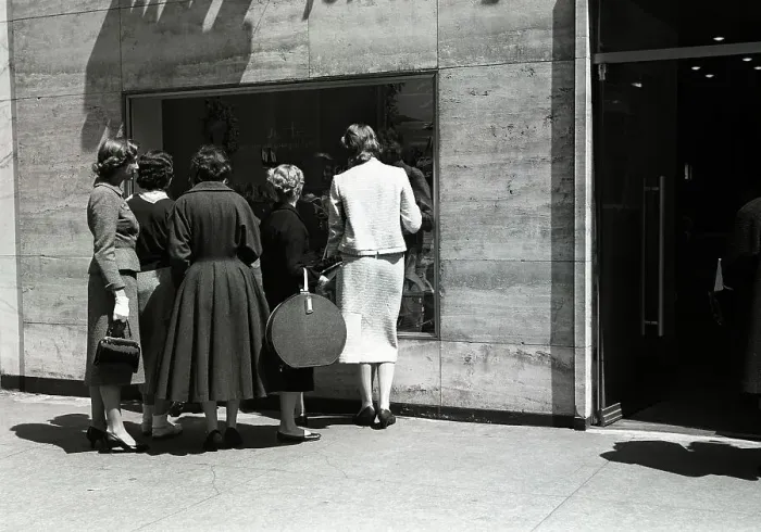 Framed Print : Women looking at window display, rear view Framed Print : Women looking at window display, rear view