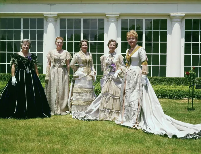 Framed Print : Women Modeling Gowns on Lawn Framed Print : Women Modeling Gowns on Lawn
