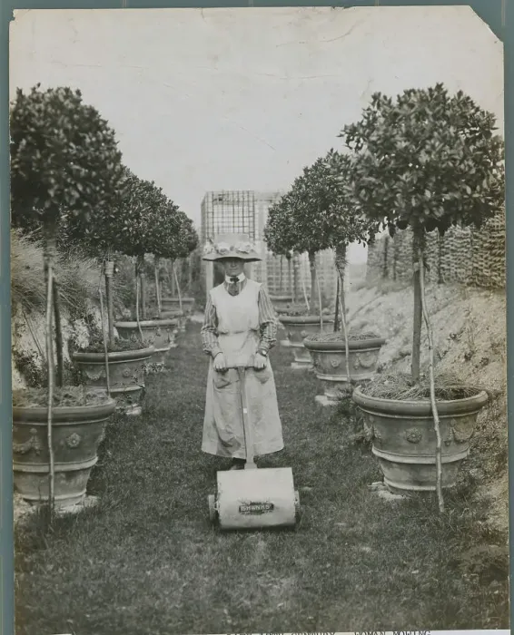 Framed Print : Women Mowing Lawn Framed Print : Women Mowing Lawn