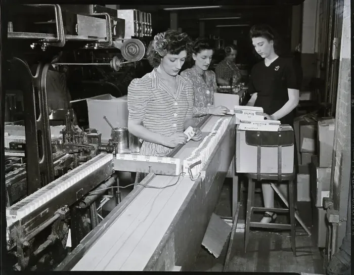 Framed Print : Women Packaging Cigarettes In Factory Framed Print : Women Packaging Cigarettes In Factory