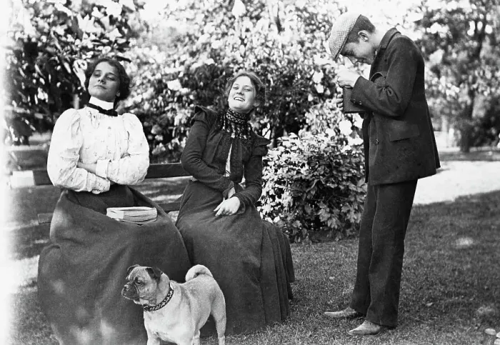 Framed Print : Women Pose On Bench For Boy W / Camera