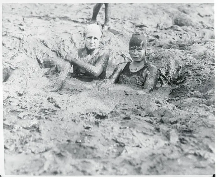 Framed Print : Women Relaxing in Mud Framed Print : Women Relaxing in Mud