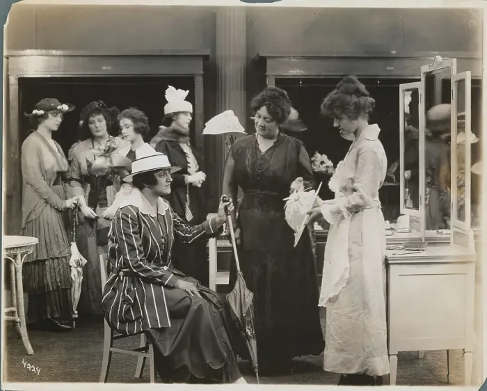 Framed Print : Women Shopping for Hats