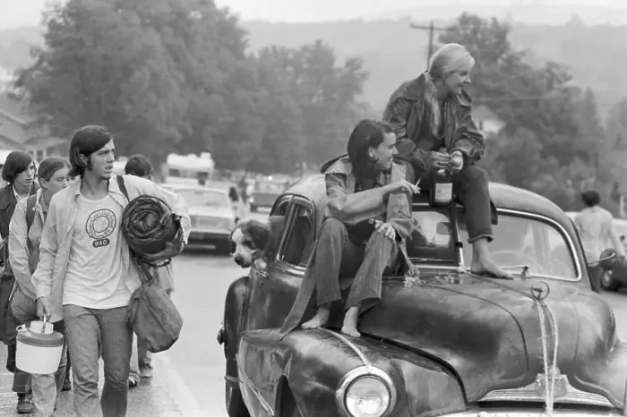 Framed Print : Two Women Sitting on Car Leaving Woodstock Framed Print : Two Women Sitting on Car Leaving Woodstock