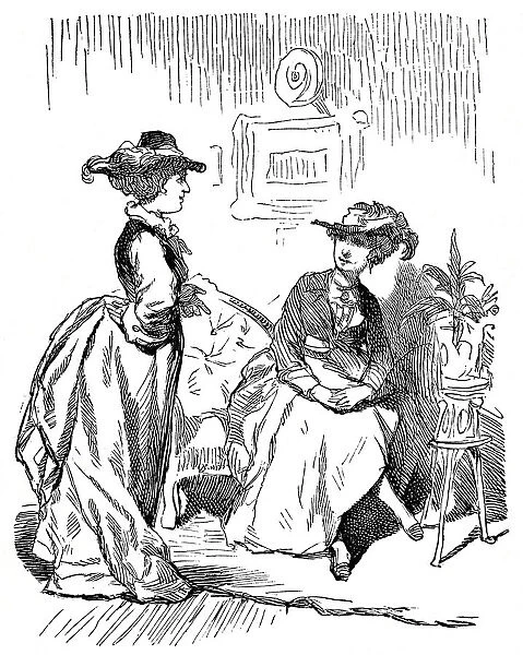 Two women sitting in living room, having talks