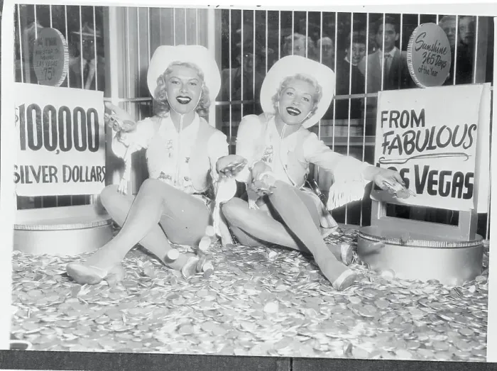 Framed Print : Women Sitting on Silver Dollars Framed Print : Women Sitting on Silver Dollars