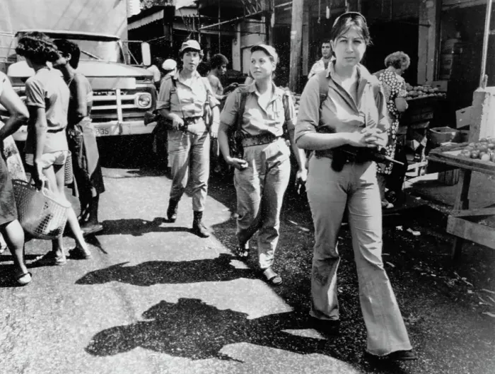 Framed Print : Women Soldiers Patrolling Market Framed Print : Women Soldiers Patrolling Market