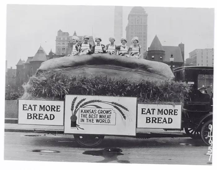 Framed Print : Women Standing in a Large Loaf of Bread Framed Print : Women Standing in a Large Loaf of Bread