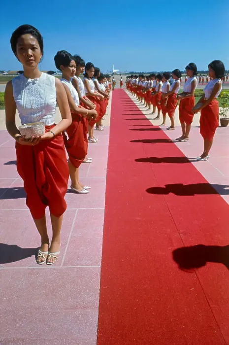 Framed Print : Women Standing Next to a Red Carpet Framed Print : Women Standing Next to a Red Carpet