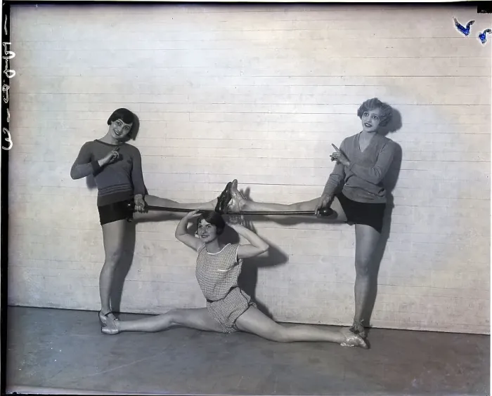 Framed Print : Three Women In Stretch-Pose In Gymnasium Framed Print : Three Women In Stretch-Pose In Gymnasium