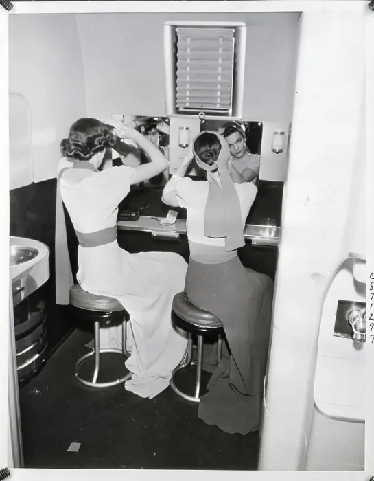 Framed Print : Two Women Styling Their Hair