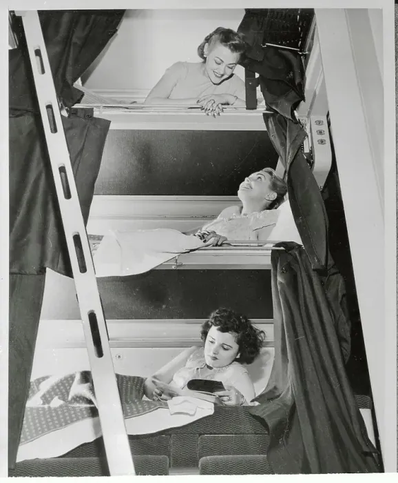 Framed Print : Women Testing a Three-Tier Sleeper Framed Print : Women Testing a Three-Tier Sleeper