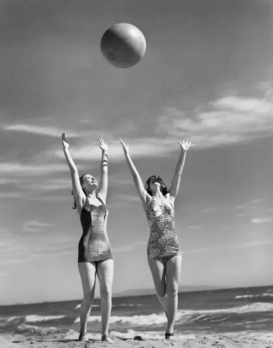 Framed Print : Women Throwing Ball at Beach Framed Print : Women Throwing Ball at Beach