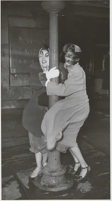 Framed Print : Women Using Pole for Support