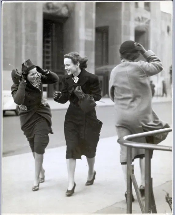 Framed Print : Women Walk Against the Wind Framed Print : Women Walk Against the Wind