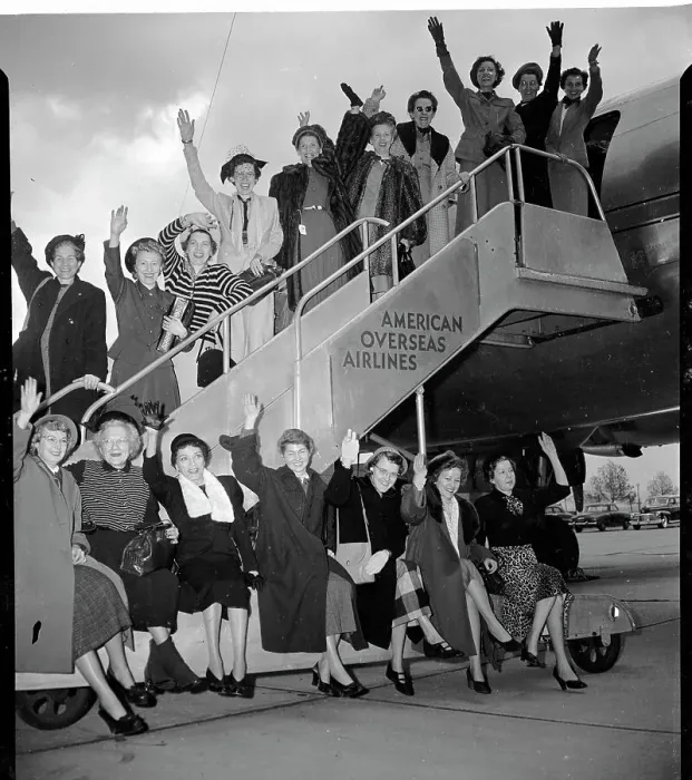 Framed Print : Women Wave as They Board Plane Framed Print : Women Wave as They Board Plane