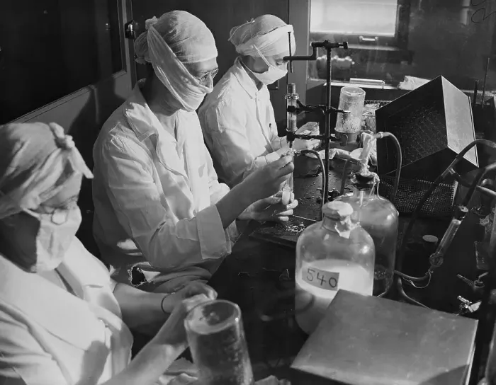 Framed Print : Women Wear Masks In Lab; Fill Vials Framed Print : Women Wear Masks In Lab; Fill Vials
