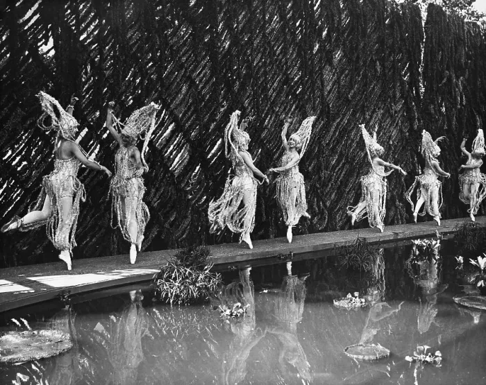 Framed Print : Women wearing costume dancing at pond Framed Print : Women wearing costume dancing at pond