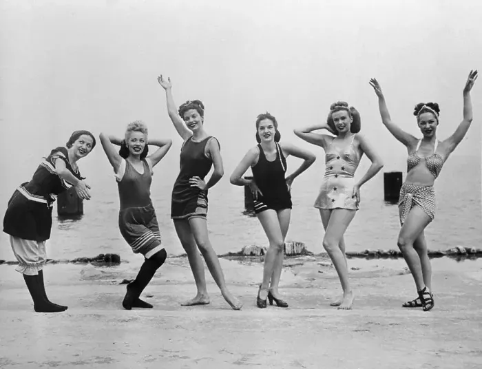 Framed Print : Women Wearing Progression of Swimsuit Styles on Beach Framed Print : Women Wearing Progression of Swimsuit Styles on Beach