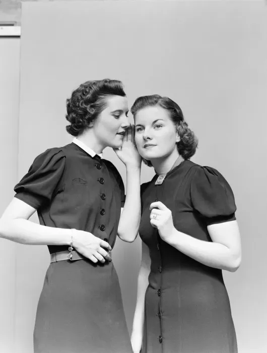 Framed Print : Two women whispering. (Photo by H. Armstrong Roberts / Retrofile / Getty Images) Framed Print : Two women whispering. (Photo by H. Armstrong Roberts / Retrofile / Getty Images)