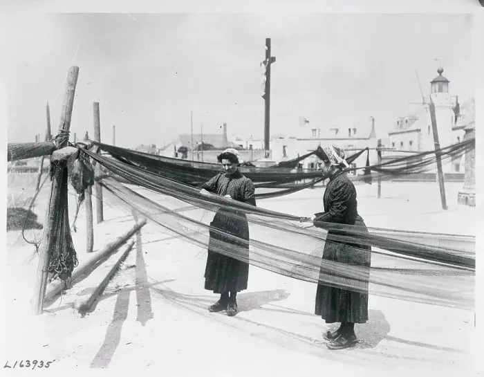 Framed Print : Women Working on Pier with Nets Framed Print : Women Working on Pier with Nets