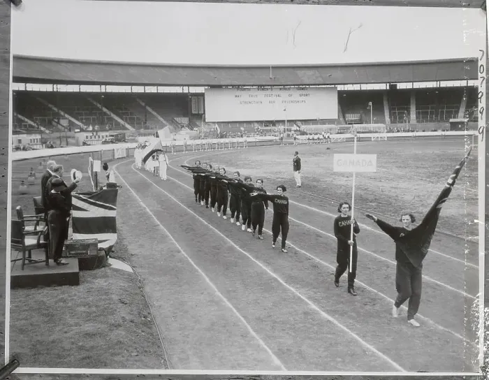 Framed Print : Women's Track Team Walking Around Stadium Framed Print : Women's Track Team Walking Around Stadium