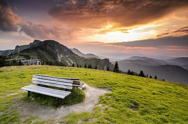 Wooden bench on the summit of Mt Brauneck, Bavaria, Germany, Europe