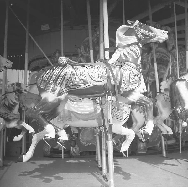 Wooden carousel horses, (B&W)