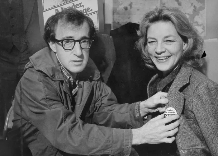 Framed Print : Woody Allen Pinning a Button on Lauren Bacall Framed Print : Woody Allen Pinning a Button on Lauren Bacall