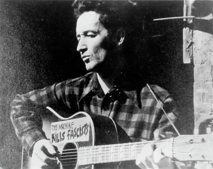 Framed Print : Woody Guthrie Portrait With Guitar Framed Print : Woody Guthrie Portrait With Guitar