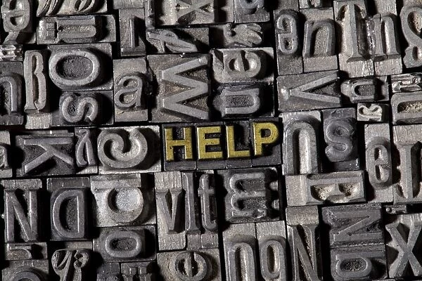 The word help, made of old lead type