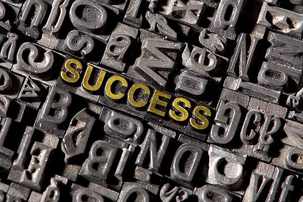 The word Success, made of lead type
