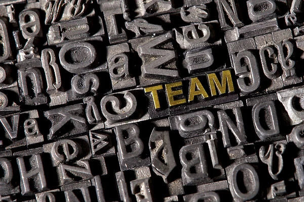The word team, made of lead type