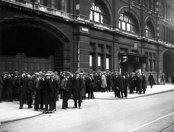Back To Work A group of railwaymen outside Liverpool Street Station