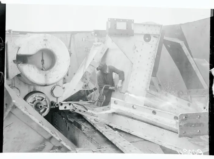 Framed Print : Worker Dismantling Heligoland Weaponry Structure Framed Print : Worker Dismantling Heligoland Weaponry Structure
