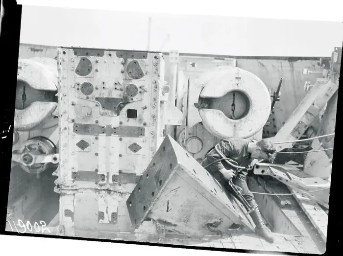 Framed Print : Worker Dismantling Heligoland Weaponry Structure Framed Print : Worker Dismantling Heligoland Weaponry Structure
