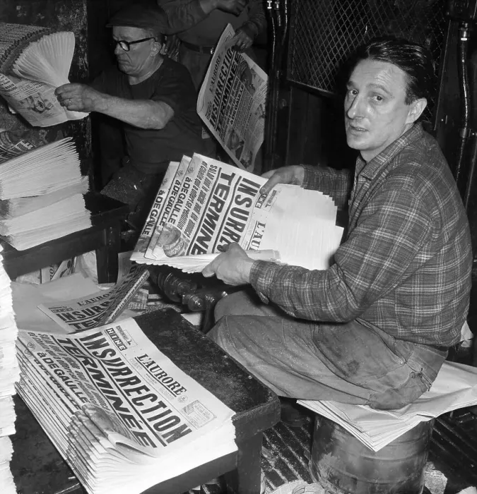 Framed Print : Worker Holding Newspaper Announcing Insurrection Terminated Framed Print : Worker Holding Newspaper Announcing Insurrection Terminated