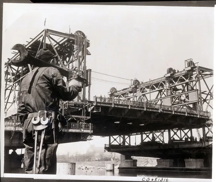 Framed Print : Worker with Large Wrench at Bridge Framed Print : Worker with Large Wrench at Bridge