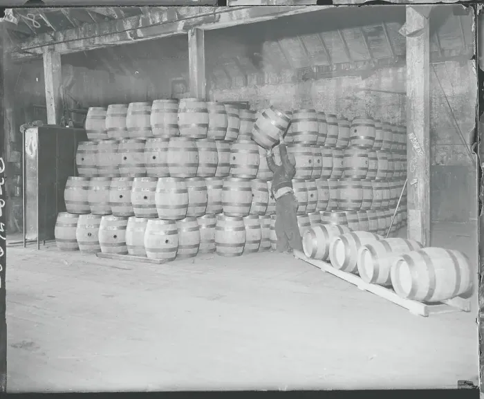 Framed Print : Worker Lifting Beer Barrel Framed Print : Worker Lifting Beer Barrel